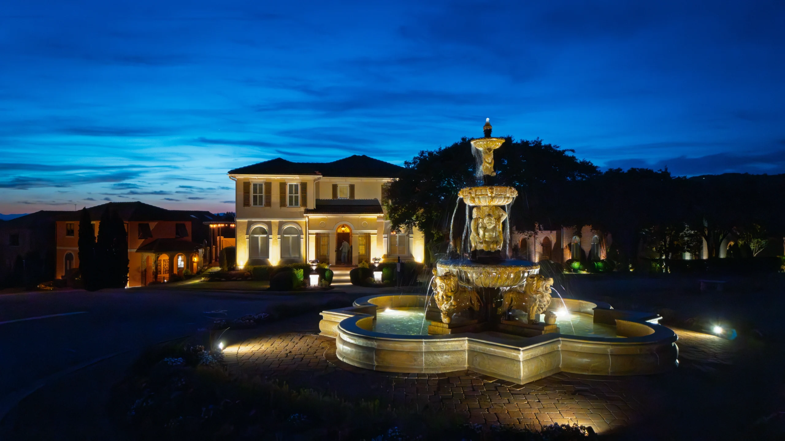 Professional outdoor lighting highlighting a luxury estate fountain in south carolina.